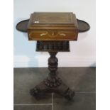 A rosewood workbox on a carved column and platform base - width 63cm x height 82cm - possibly