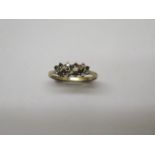 A hallmarked 9ct gold diamond and emerald ring size N - approx weight 1.5 grams