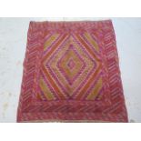 A hand knotted woollen Gazak rug - 120cm x 110cm