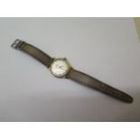 A vintage gold plated stainless steel back manual wind gents wristwatch, the dial signed Watches