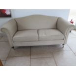 A Laura Ashley oatmeal 2 seater sofa, 192cm wide x 86cm tall x 93cm deep, in good condition