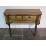 A good quality mahogany sideboard with two freize drawers and a blind drawer on reeded turned legs -