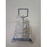 A James Dixon and Son silver four bottle cruet stand with associated pieces - stand approx 13.3 troy