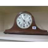 An 8 day oak case mantle clock with Westminster chimes