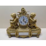 An impressive Henri Marc of Paris gilt bronze figural mantle clock with enamel dial striking on a