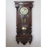 A large mahogany wallclock with double weight movement 8 day gong strikes on a gong, 120cm tall,