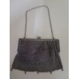 A Continental 800 silver chain mail opera bag, 14cm wide, approx 4.6 troy oz, interior worn with