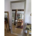 A large modern silver framed mirror, 182cm x 81cm, minor marks to frame but generally good