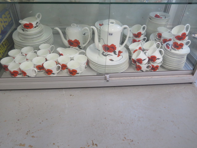 A large collection of Wedgewood Susie Cooper Cornpoppy table ware including 27cm plates, 20cm bowls,