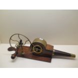 A 19th century hand crank wood and brass fire bellows, 70cm long, in working order with a good