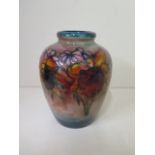 A Moorcroft Blush flambe flower decorated vase, 17cm tall, in good condition, overall crazing and no