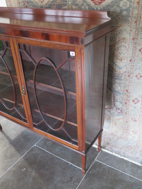 An Edwardian mahogany two door astragel glazed display cabinet with three adjustable shelves, in - Image 2 of 3