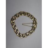 A continental yellow gold bracelet, tests to approx 18ct, with safety chain and clasp, total