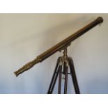 A 19th century style reproduction brass telescope on stand