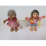 A Steiff Macki figure with button and labels and a Steiff Mucki, figure no button or label