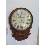 A mahogany drop dial 8 day striking wallclock with a W & H movement and 12" dial, running, case