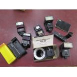 A collection of six vintage camera flash units including Centon Ring Flash, Cobra, Miranda, Vivitar,