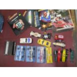 An assorted lot of Scalextric and Airfix racing cars magazines - some boxed, some loose and apart