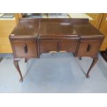 An oak Art Deco style three drawer side table on shaped legs, 82cm tall x 107cm x 47cm