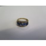 A 9ct hallmarked yellow gold cabochon five stone sapphire ring size N - approx weight 3.9 grams - in
