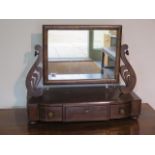 An early 19th century mahogany toilet mirror with three drawers - height 50cm x 60cm x 25cm