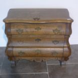 A small oak three drawer bombe shaped chest of drawers - Height 66cm x 76cm x 41cm