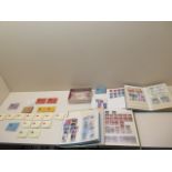 Three stamp stock books, a collection of 20 complete stamp booklets and loose stamps and three