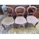 A set of three Victorian balloon back chairs