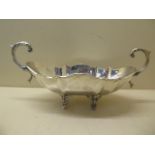 A Egyptian silver twin handle bowl, 30cm wide, approx 14.8 troy oz, no engraving and in generally
