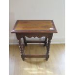 An oak joint stool on bobbin turned support, 56cm tall x 50cm x 28cm, in sound usable condition