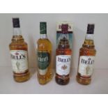 A litre bottle of Bells blended Scotch whiskey, a 70cl bottle of Bells whisky, a 70cl bottle of