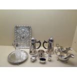 An interesting collection of plated ware including side handle coffee pot, pair of sauce boats,