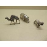 Two silver hallmarked Hippos and a silver Camel, largest 6.5cm long, total weight approx 7.5 troy