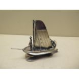 A Dutch silver model of a sailing boat, 12cm long x 9cm tall, approx 3.4 troy oz, in good condition