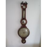 A 19th century mahogany banjo barometer, 110cm tall