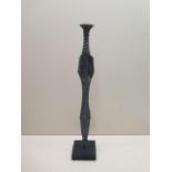 A dagger on display stand, 35cm long, with patinated finish