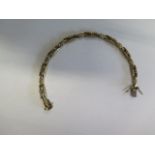 An 8ct yellow gold bracelet marked 333, 19cm long, approx 9.1 grams, in generally good condition