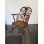 A 19th century ash and elm stick back Winsor armchair, 84cm tall x 53cm wide x seat height 44cm,