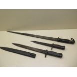 Three bayonets, longest 68cm long and shortest 30cm, please see images for condition