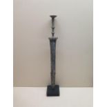 A dagger on display stand, 39cm long, with patinated finish