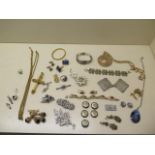 A good selection of assorted jewellery including a 9ct gold jade ring, approx 1.7 grams, size N, a