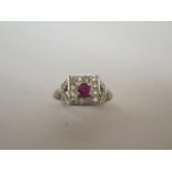 A ruby and diamond hallmarked 9ct yellow gold ring, size O/P, head approx 9mm x 8mm, approx 3 grams,