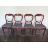 A set of four Victorian mahogany balloon back dining chairs with reupholstered seats in generally
