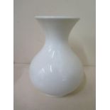 A William Moorcroft whiteware pottery vase, impressed signature and hallmark to base, 15cm tall,