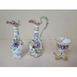 A Meissen style floral encrusted scent ewer, repair to handle and foliate damage, 20cm tall and a