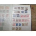 A collection of over 300 Chinese stamps in a stock book
