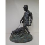 A large bronze of hunter and dog, 62cm tall x 45cm, unsigned with green patination