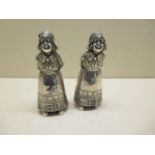 A pair of Dutch silver Dutch girl peppers, 12cm tall, total weight approx 8.8 troy oz, marked 930,