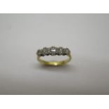 A hallmarked 18ct gold five stone illusion set diamond ring, size M, approx 2.9 grams, generally