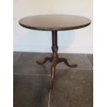 A mahogany tripod side table with a one piece top , repairs to base but sturdy and a good colour, 67